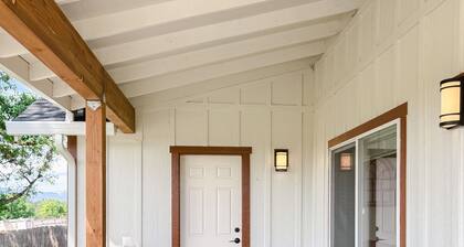 Unwind in this stylish, fully remodeled farmhouse with mountain views and a private hot tub