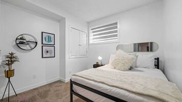 2 bedrooms, desk, iron/ironing board, travel crib