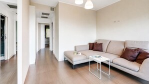Family Apartment, 2 Bedrooms, 2 Bathrooms, Mountainside (Aquavista Pool and Lake Maggiore View) | Living area | Smart TV - Aquavista Pool and Lake Maggiore View (Meina)