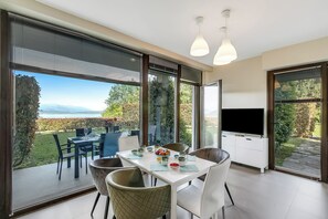 Family Apartment, Multiple Bedrooms, 2 Bathrooms, Mountainside (Aquavista Pool and Lake View) | Dining - Aquavista Pool and Lake View (Meina)