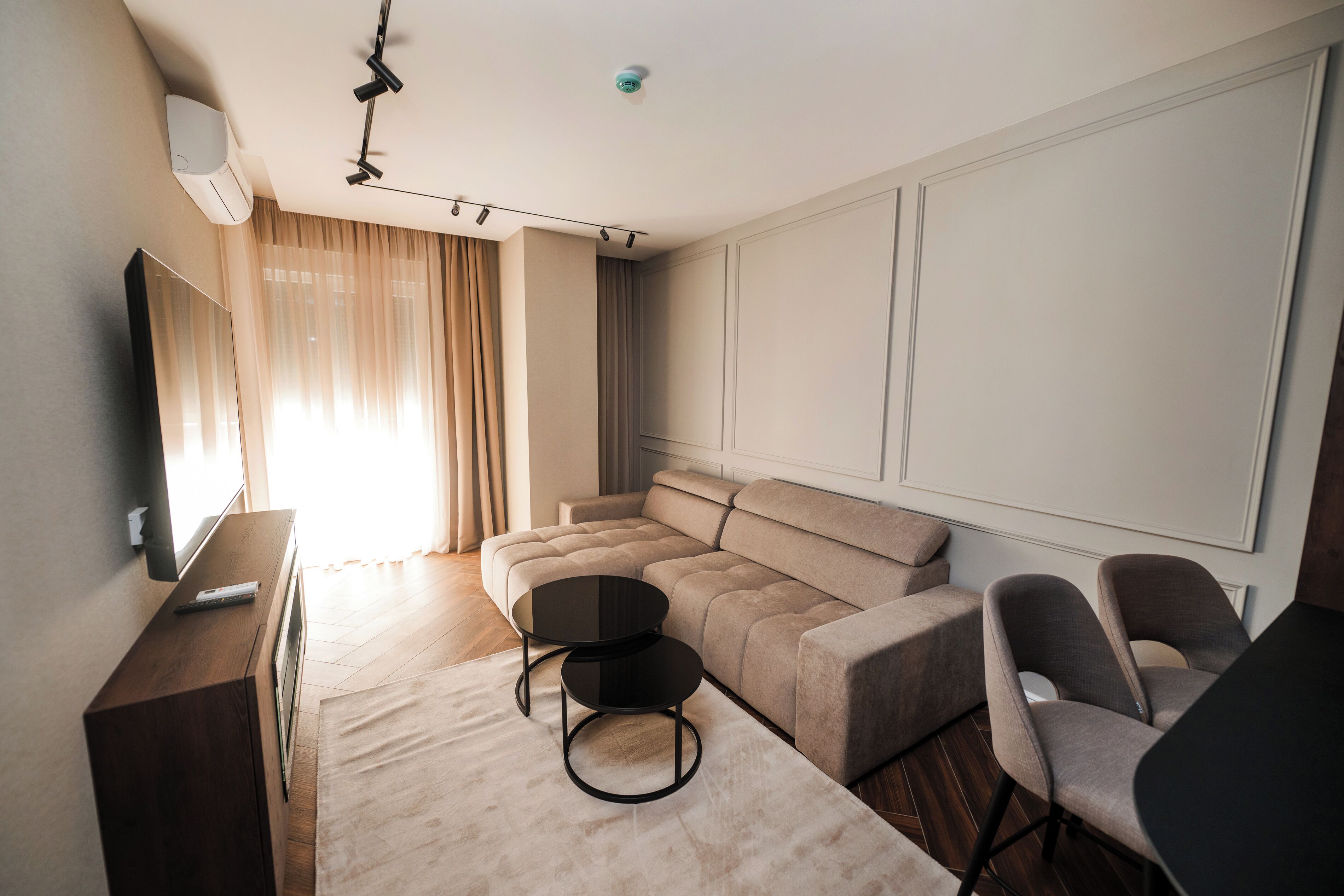 Deluxe Apartment, Balcony, City View | Living area | 64-inch LED TV with satellite channels