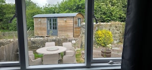 Comfort Room, Private Bathroom, Garden View | 1 bedroom, laptop workspace, iron/ironing board, free WiFi