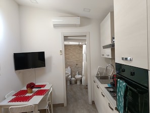 House, 2 Bedrooms, Smoking, Balcony | Living room | Books - Recanto do sol Apartment (Catania)