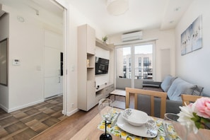 Apartment (183C) | Living area | Flat-screen TV - Apartamenty Sun&Snow Steam Park (Kraków)