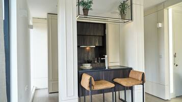 Apartment | Private kitchen | Microwave, stovetop, toaster, cookware/dishes/utensils