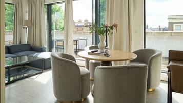 Apartment | Living area | 50-inch flat-screen TV with digital channels