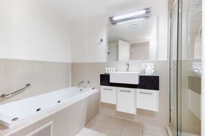 Jetted bath, eco-friendly toiletries, hair dryer, towels