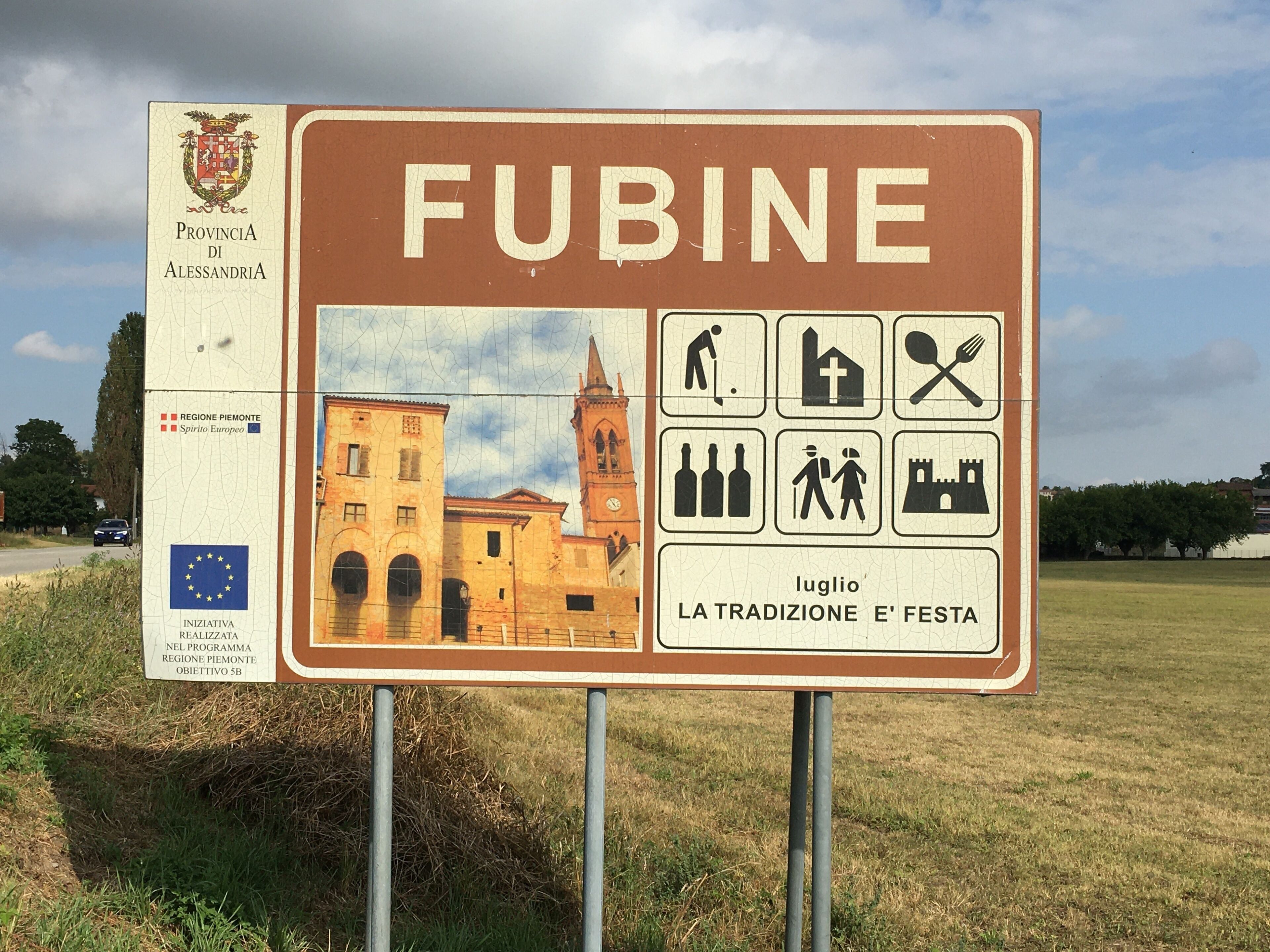 A signboard with the name 'FUBINE' and symbols indicating activities like walking, eating, and drinking.