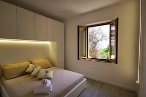 2 chambres, fer et planche à repasser