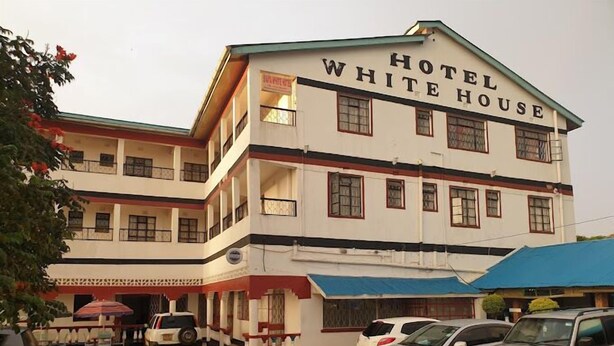 A multi-story building with a sign reading "Hotel White House". - Siaya White Hotel (Siaya)