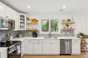 Fridge, microwave, dishwasher, coffee/tea maker