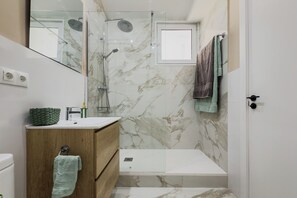 Hair dryer, towels, soap, toilet paper