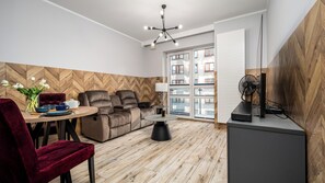 Apartamento (A703) | Área de estar | TV de tela plana