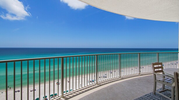 A balcony with a view of a beach and ocean. - Emerald Isle 1004 - Free Beach service! (Panama City Beach)