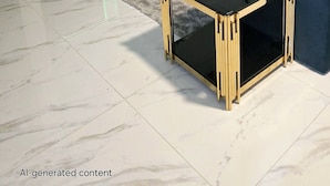 A modern living room with a blue sofa, two black glass coffee tables, and a decorative vase.