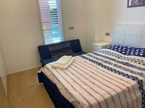 2 dormitorios, tabla de planchar con plancha, wifi y ropa de cama