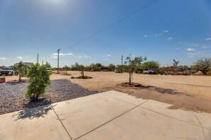 Guests can park their vehicles in this spacious area surrounded by lush greenery.