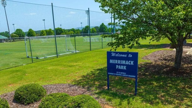 A sign welcoming visitors to Merrimack Park, indicating it's managed by the City of Haverhill's Department of Recreation & Landscape Management.