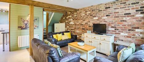 Televisio, kirjoja, työhuone