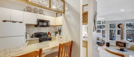 Microwave, stovetop, dishwasher, coffee/tea maker