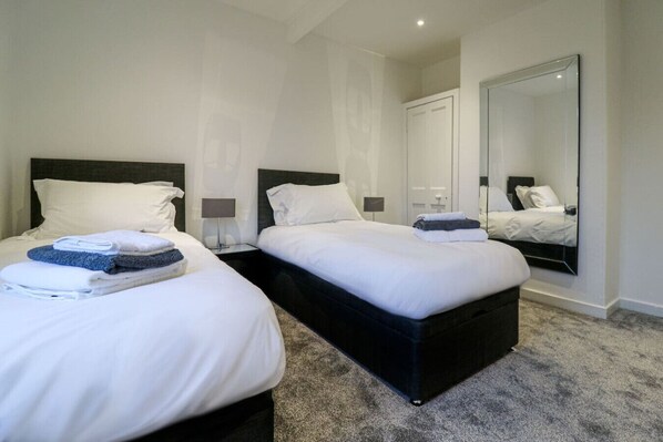 2 bedrooms, desk, iron/ironing board, travel cot