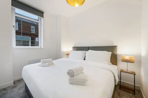 1 bedroom, desk, iron/ironing board, travel cot