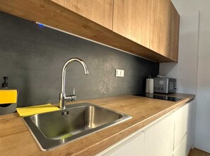 Studio (Downtown Apartment- Studio) | Private kitchen | Fridge
