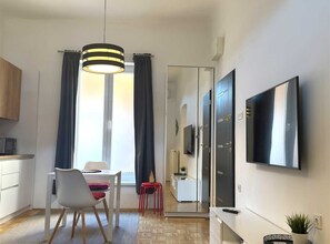 Studio (Downtown Apartment- Studio) | Living room | 32-inch flat-screen TV with cable channels