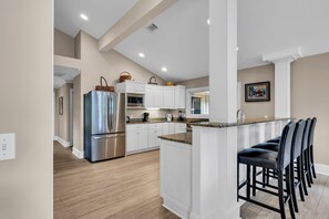 House, Multiple Beds, Pool Access, Pool View (16 Turnberry Lane) | Private kitchen | Coffee/tea maker, dining tables