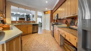 House, Multiple Beds, Pool Access, Pool View (14 Genoa Court) | Private kitchen | Coffee/tea maker, dining tables