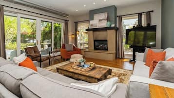 Smart TV, fireplace, books