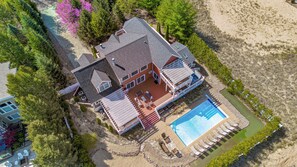 Exterior - Juniper Presents: Sunny Dunes Retreat w/ Pool, Hot Tub & Golf Carts (Grand Beach)