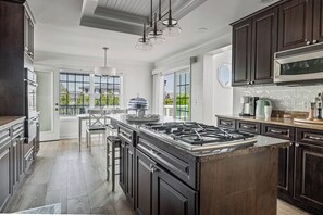 Fridge, microwave, oven, stovetop - Juniper Presents: Sunny Dunes Retreat w/ Pool, Hot Tub & Golf Carts (Grand Beach)