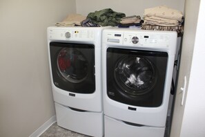 Interior - Sleeps 2-13 people, 2 bunkrooms, 2 bath, laundry, bar, kitchen-building Main St. (Groton)