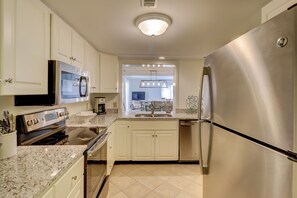 Villa, Multiple Beds, Kitchen, Golf View (436 Plantation Club Villas) | Private kitchen | Coffee/tea maker, dining tables