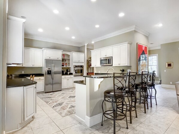 House, Multiple Beds, Kitchen, Garden View (90 Shell Ring Road) | Private kitchen | Coffee/tea maker, dining tables - 90 Shell Ring Road at The Sea Pines Resort (Hilton Head Island)