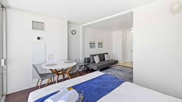 Queen bed and cute table and sofa bed