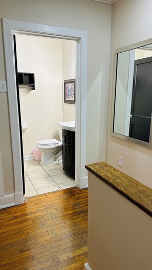 Hair dryer, towels, shampoo, toilet paper