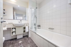 Shower, hair dryer, towels