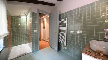 Deluxe Apartment | Bathroom | Shower, rainfall showerhead, hair dryer, bathrobes
