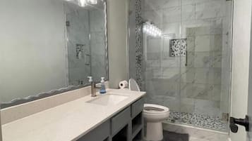 Hair dryer, towels, soap, toilet paper