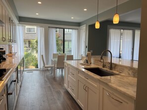 Villa, Multiple Beds, Kitchen, Garden View (1259 Harbour Town Club) | Private kitchen | Coffee/tea maker, dining tables