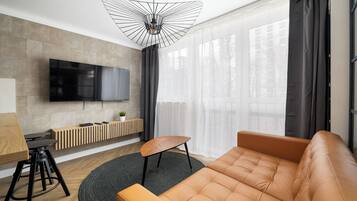 Studio (111) | Living area | Flat-screen TV