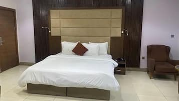 Deluxe Room, Balcony, City View | Desk, laptop workspace, blackout curtains, soundproofing