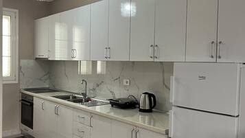 Fridge, oven, electric kettle, toaster