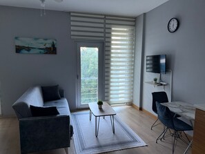 Chambre Confort | Coin séjour