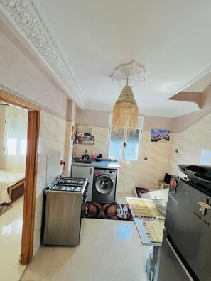 Apartamento, vista para a praia | Área de estar