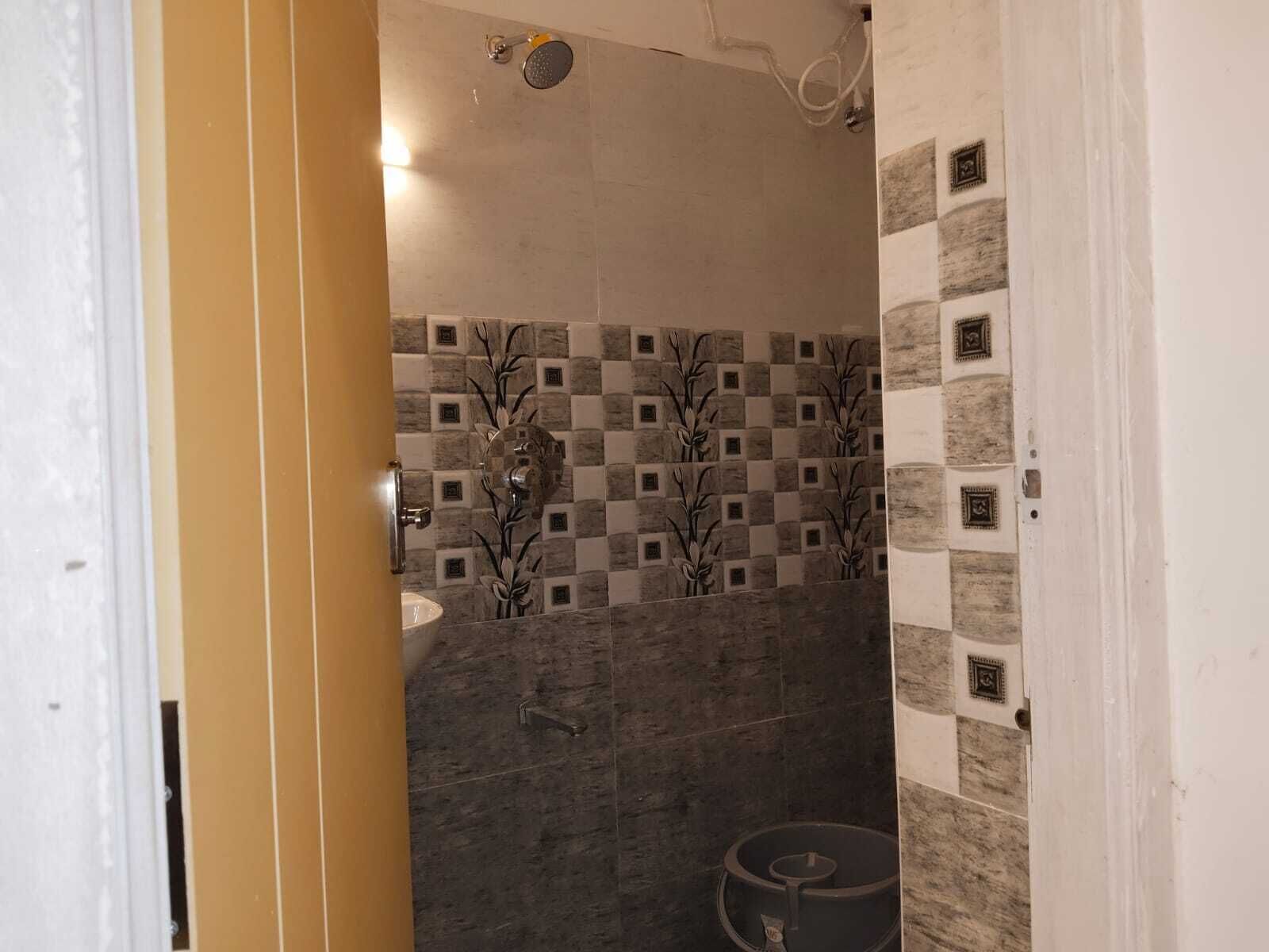 Douche, articles de toilette gratuits, serviettes fournies, savon