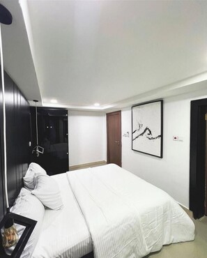 Departamento familiar, balcón, vista a la ciudad | Escritorio, espacio para trabajar con laptop y cortinas blackout 