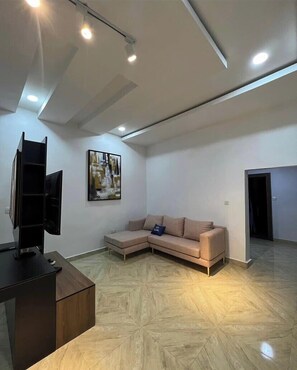 Appartement Familial, balcon, vue ville | Coin séjour